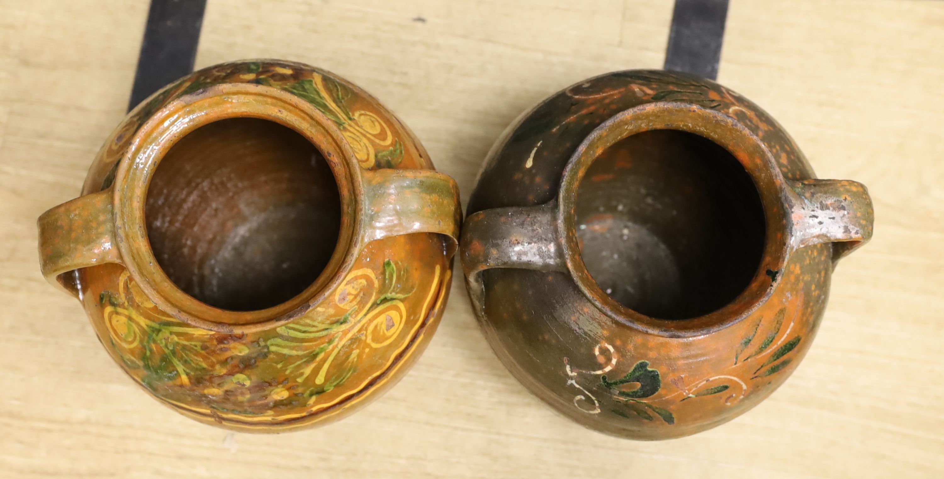 Two 19th century Continental Europe pottery urns - 35cm high